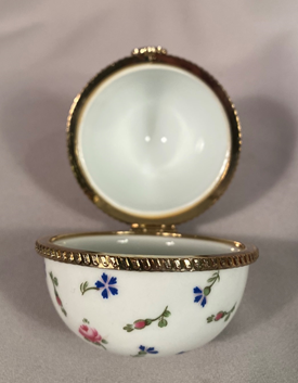Hand painted vintage floral signed Regal Porcelain egg shaped trinket box