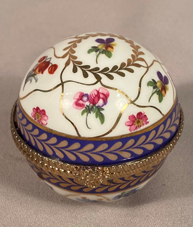 Signed Regal Porcelain, Round Trinket Box Hand painted flowers gilt metal design