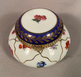 Signed Regal Porcelain hand painted trinket box gilt metal decoration flowers