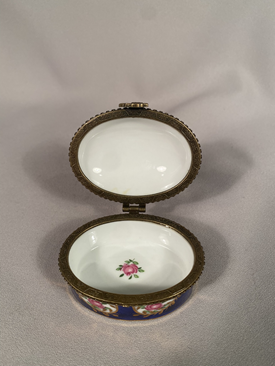 Hand painted Limoges trinket oval shaped box signed in script L for Limoges