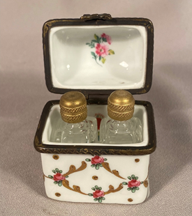 Rare Limoges Hand Painted Porcelain Box with 2 miniature bottles inside.