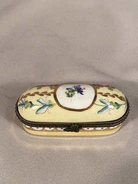 Beautiful Oblong Limoges porcelain trinket box excellent condition.